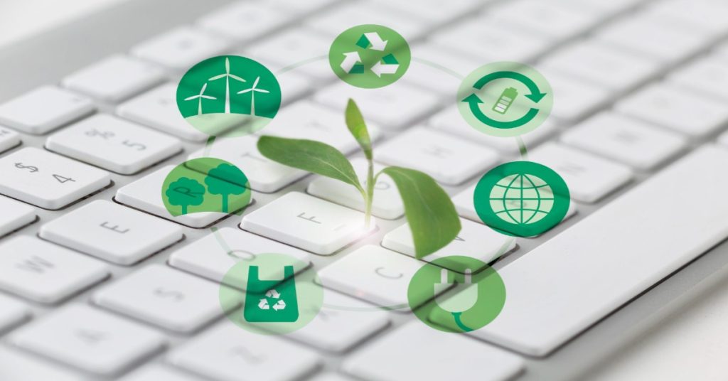 Green eco-friendly icons on a keyboard, highlighting the advantages of online surveys for sustainability and corporate responsibility.