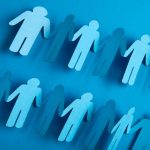 A group of blue paper cutouts representing people on a blue background, illustrating the concept of sample size in surveys.