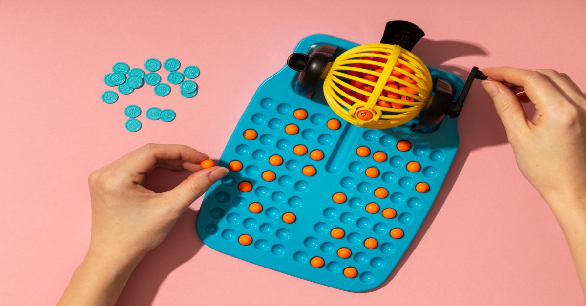 A person engages with a board and ball, demonstrating probability sampling for effective research.