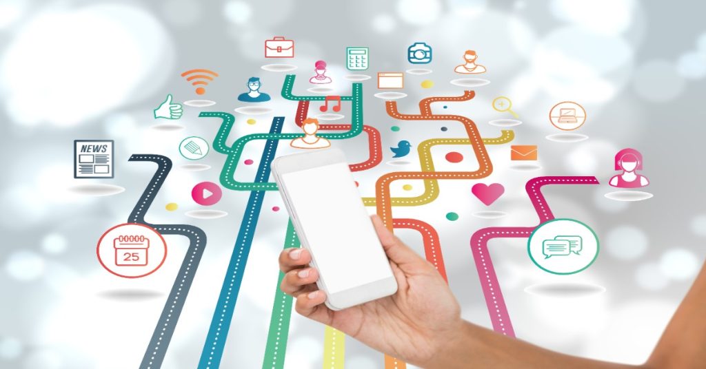 A hand with a smartphone featuring social icons, encouraging survey distribution for more survey participation.